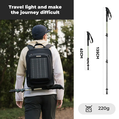 Person wearing a black backpack with solar panel, hiking pole, and measurement details on a white background.#color_green